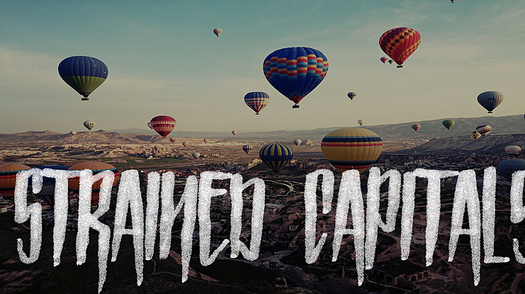 Strained Capitals Font Family