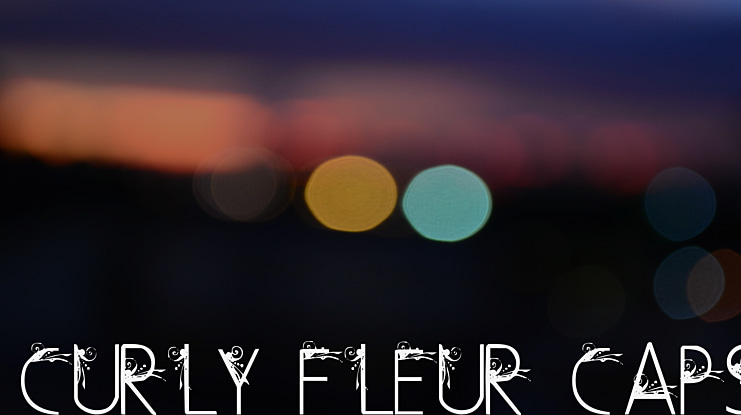 Curly Fleur Caps Font